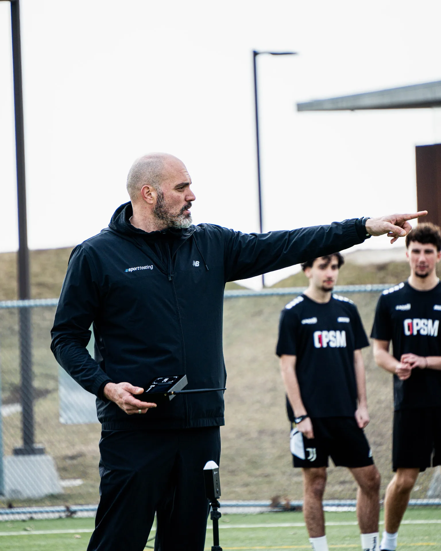 OPSM combine director instructing players on the field